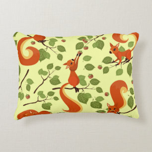 Red squirrel in hazel branches. decorative cushion
