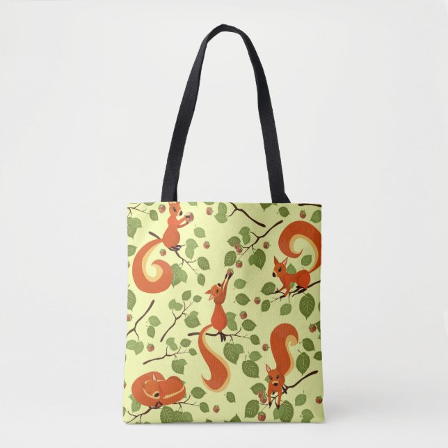 Red squirrel in hazel branches. tote bag (Front)