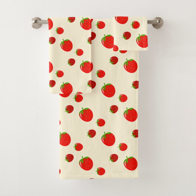 Red strawberry pattern on pale pink bath towel set (Insitu)