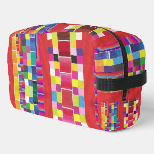 red swatches, stripes, and colourful pixels dopp kit