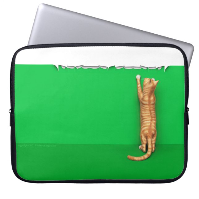 Red tabby cat rips paper laptop sleeve (Front)