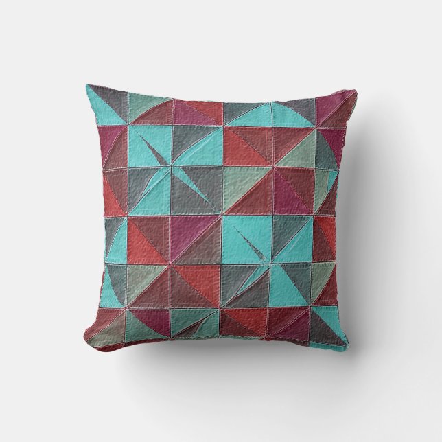 red, teal, purple, and gray quilt cushion (Front)
