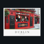 Red Temple Bar pub in Dublin, Ireland Postcard<br><div class="desc">Photo postcard of the famous red pub with the hanging flowers baskets in Temple Bar district in Dublin,  the capital of Ireland with the text 'Dublin,  Ireland' in a white box and with stripes in green,  white and orange,  the colours of the irish flag.</div>