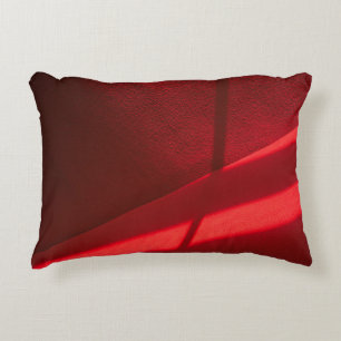 Red textile in close up photography decorative cushion