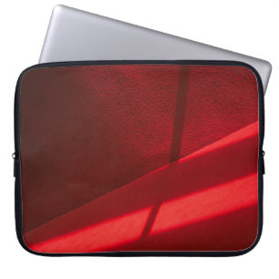Red textile in close up photography laptop sleeve