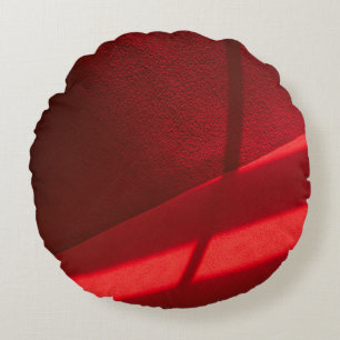 Red textile in close up photography round cushion
