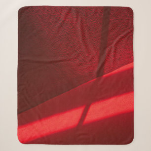 Red textile in close up photography sherpa blanket