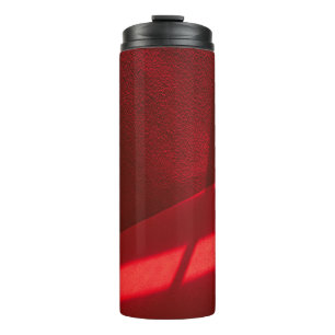 Red textile in close up photography thermal tumbler