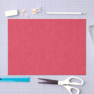 Red textured background with swirling pattern tissue paper