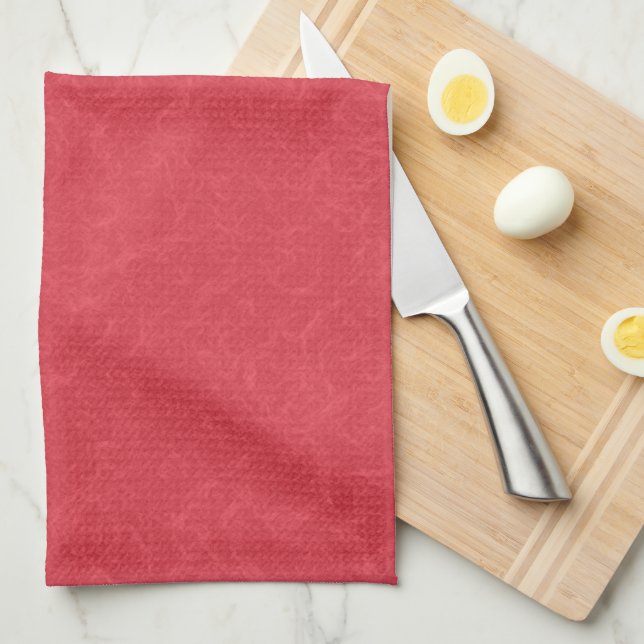 Red textured surface with subtle swirling pattern tea towel (Quarter Fold)
