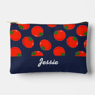 Red tomatoes on blue accessory pouch