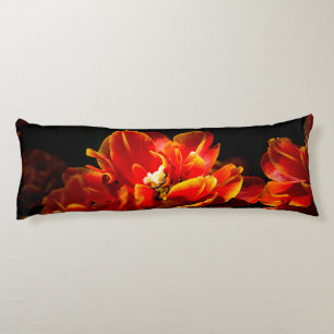 Red tulips dark background body cushion