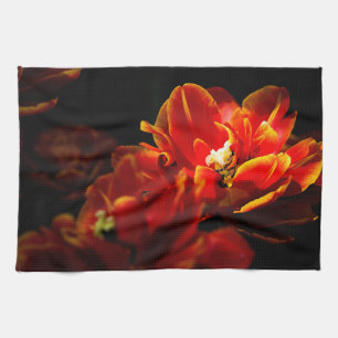 Red tulips dark background tea towel