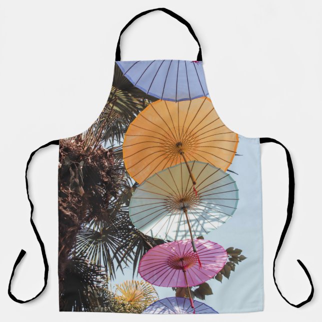 Red umbrella on green tree apron (Front)