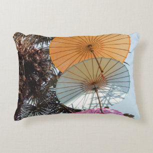 Red umbrella on green tree decorative cushion