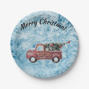 red vintage truck on a blue snowflake background paper plate