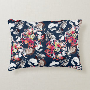 Red, white flowers on blue. decorative cushion