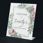 Red White Rose Floral Holly 80th Birthday Party Pedestal Sign<br><div class="desc">A delicate and festive holiday frame contains red and white roses nestled in holly and eucalyptus leaves. The birthday celebrant's name and birthday year are written in a pretty red. Perfect for a winter holiday birthday party. Easy to customise.</div>