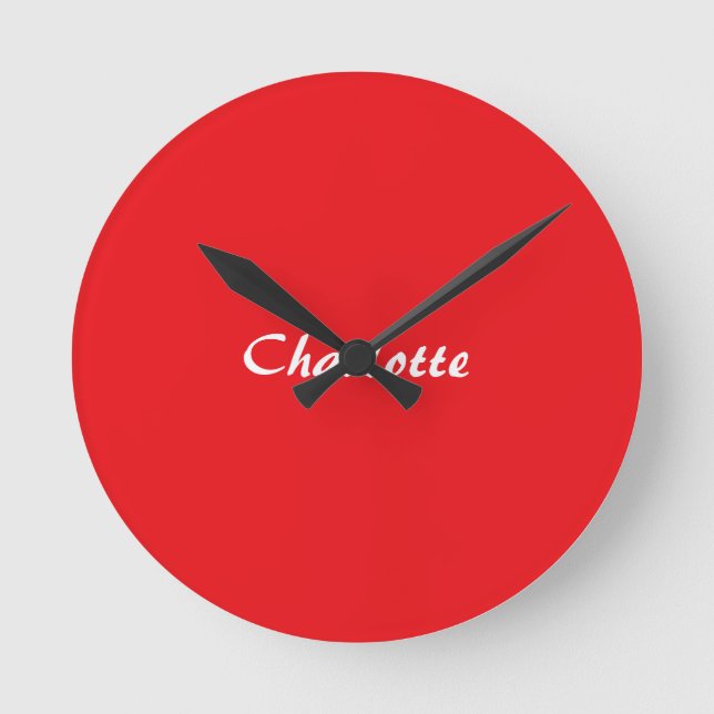 Red White Script Elegant Minimalist Modern Name Round Clock (Front)