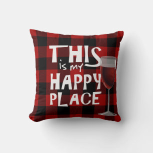 red wine and quote on buffalo plaid cushion