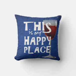 red wine with happy quote cushion