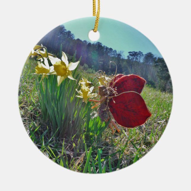 red wing fairy and daffodils ceramic ornament (Front)