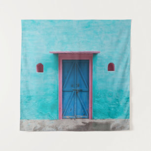 RED WOODEN DOOR ON BLUE CONCRETE WALL TAPESTRY