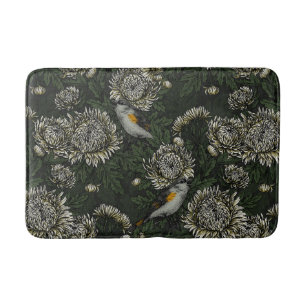 Redstarts in the chrysanthemums in green and white bath mat