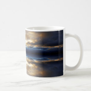 Reflected clouds at sunset coffee mug