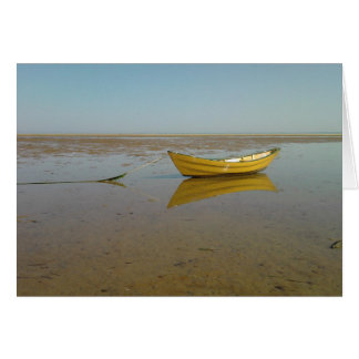 Reflection of a yellow boat