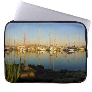 Reflection of boats in a harbor. laptop sleeve