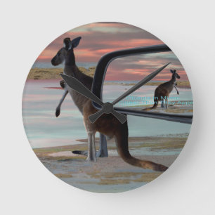 "Reflections of the Wild: A Kangaroo on the Beach  Round Clock