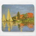 Regatta at Argenteuil by Claude Monet Mouse Pad<br><div class="desc">Regatta at Argenteuil (1872) by Claude Monet is a vintage impressionism fine art nautical painting. You can see the reflection of the sailboats in the lake water. A maritime seascape with a yacht or boat race on a sunny summer season day. About the artist: Claude Monet (1840-1926) was a founder...</div>