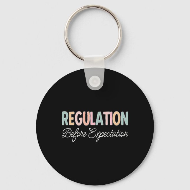 Regulation Before Expectation Key Ring (Front)