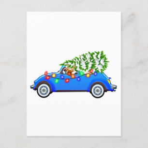 Reindeer driving a beetle with christmas treeb postcard