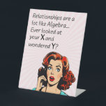 Relationships are Like Algebra Funny Quip Pedestal Sign<br><div class="desc">Add a touch of wit and humour as you or a friend celebrate newfound independence with this clever 1950s comic book-style artwork. Featuring a vintage-inspired woman deep in thought, the quote "Relationships are a lot like Algebra... Ever look at your x and wonder y?" delivers a witty epiphany, drawing a...</div>