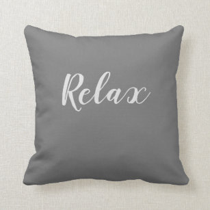 Relax hand writing on grey background cushion