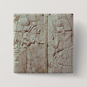 Relief depicting a guard holding 15 cm square badge