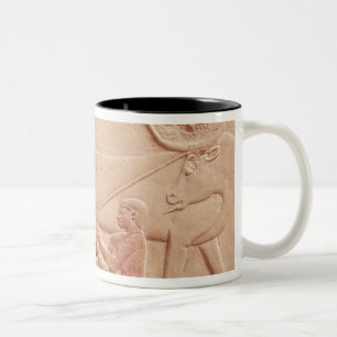 Relief depicting a man milking a cow Two-Tone coffee mug