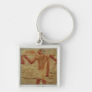 Relief depicting a porter key ring