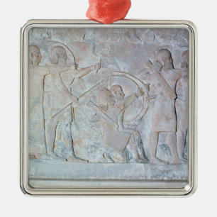 Relief depicting archers metal ornament