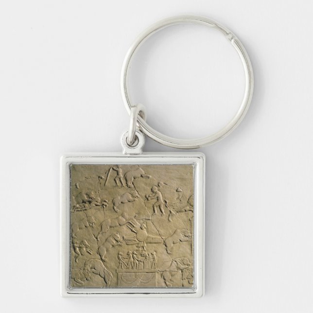 Relief depicting circus games key ring (Front)
