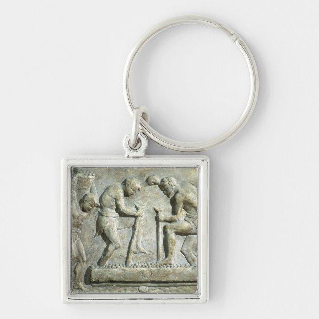 Relief depicting pavers key ring (Front)