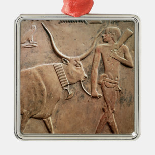 Relief depicting peasant leading cow to metal ornament