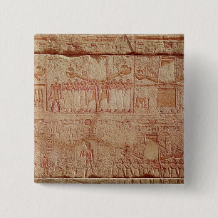 Relief depicting sacred boats carried by 15 cm square badge