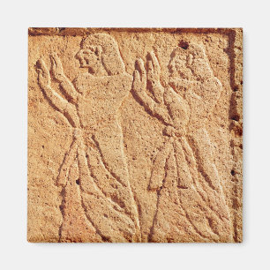 Relief depicting servant paying homage to the magnet