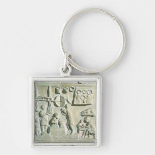 Relief depicting the interior of a forge key ring