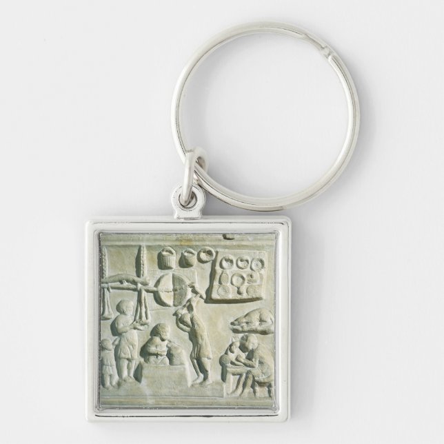 Relief depicting the interior of a forge key ring (Front)