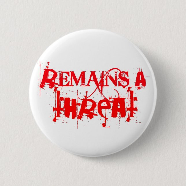 remains_a_threat_logo_in_red-pin 6 cm round badge (Front)