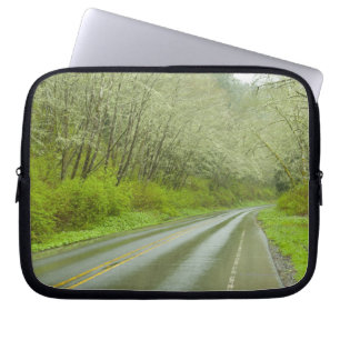 Remote highway through forest laptop sleeve